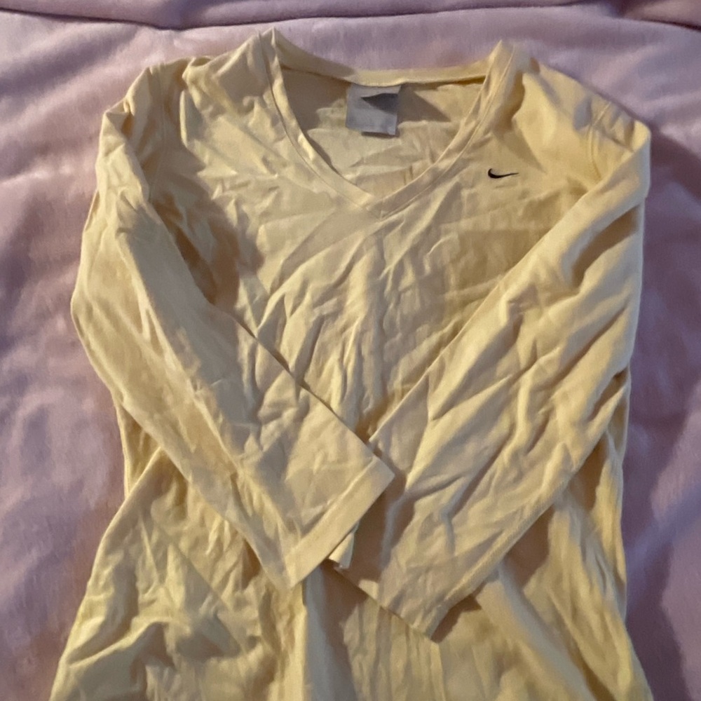 yellow nike shirt, size small